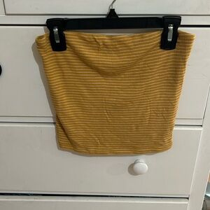 Yellow and white tube top.